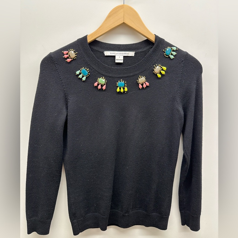 Diane Von Furstenberg black long sleeve top.